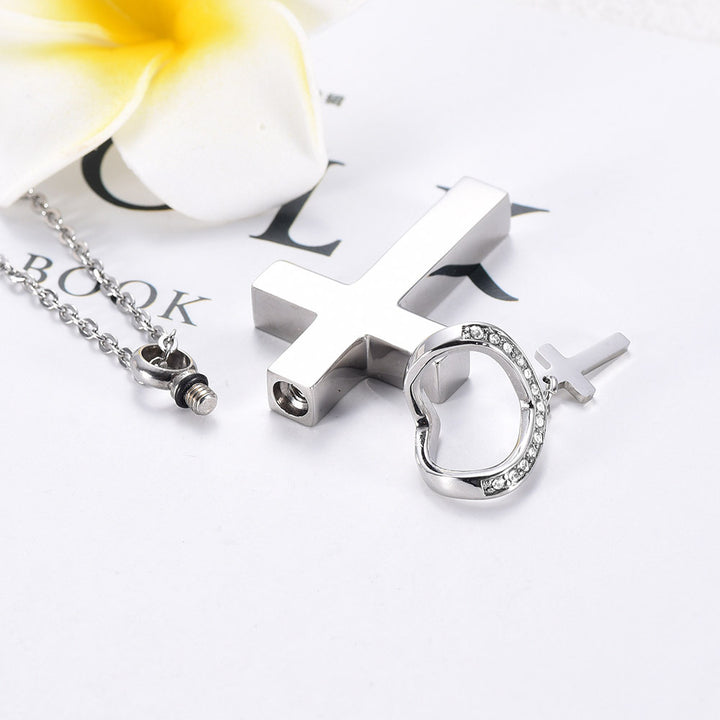 Cross necklace (can hold ashes/perfume)
