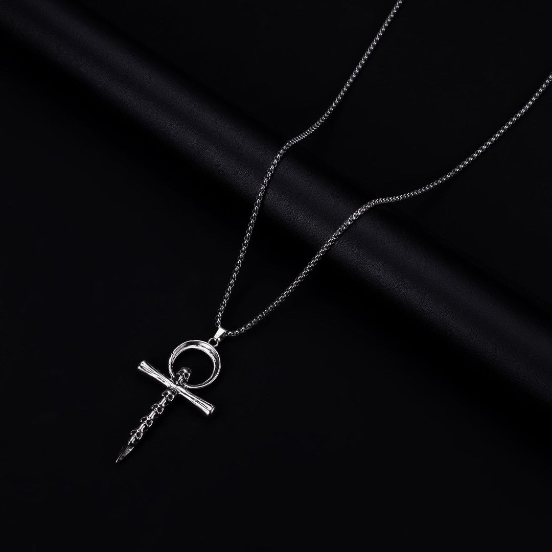 Multi-skull cross necklace