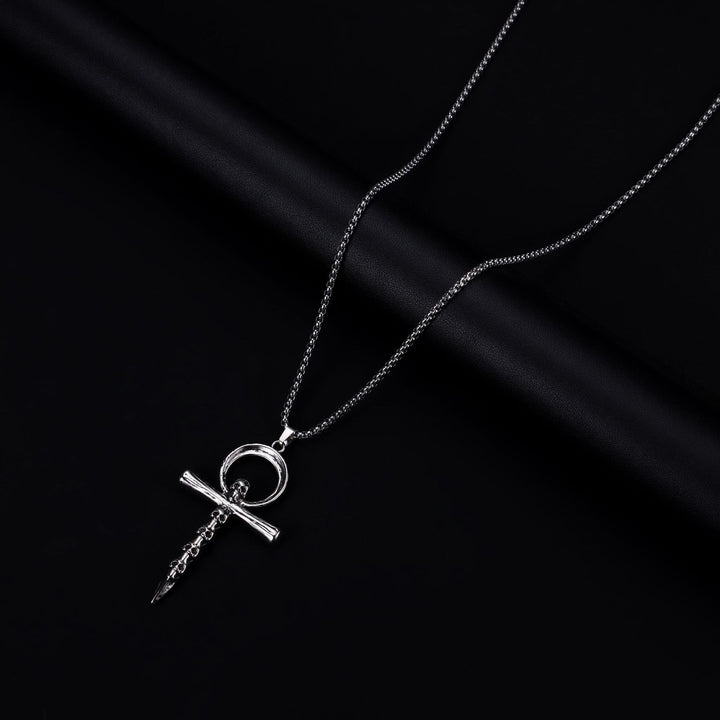 Multi-skull cross necklace