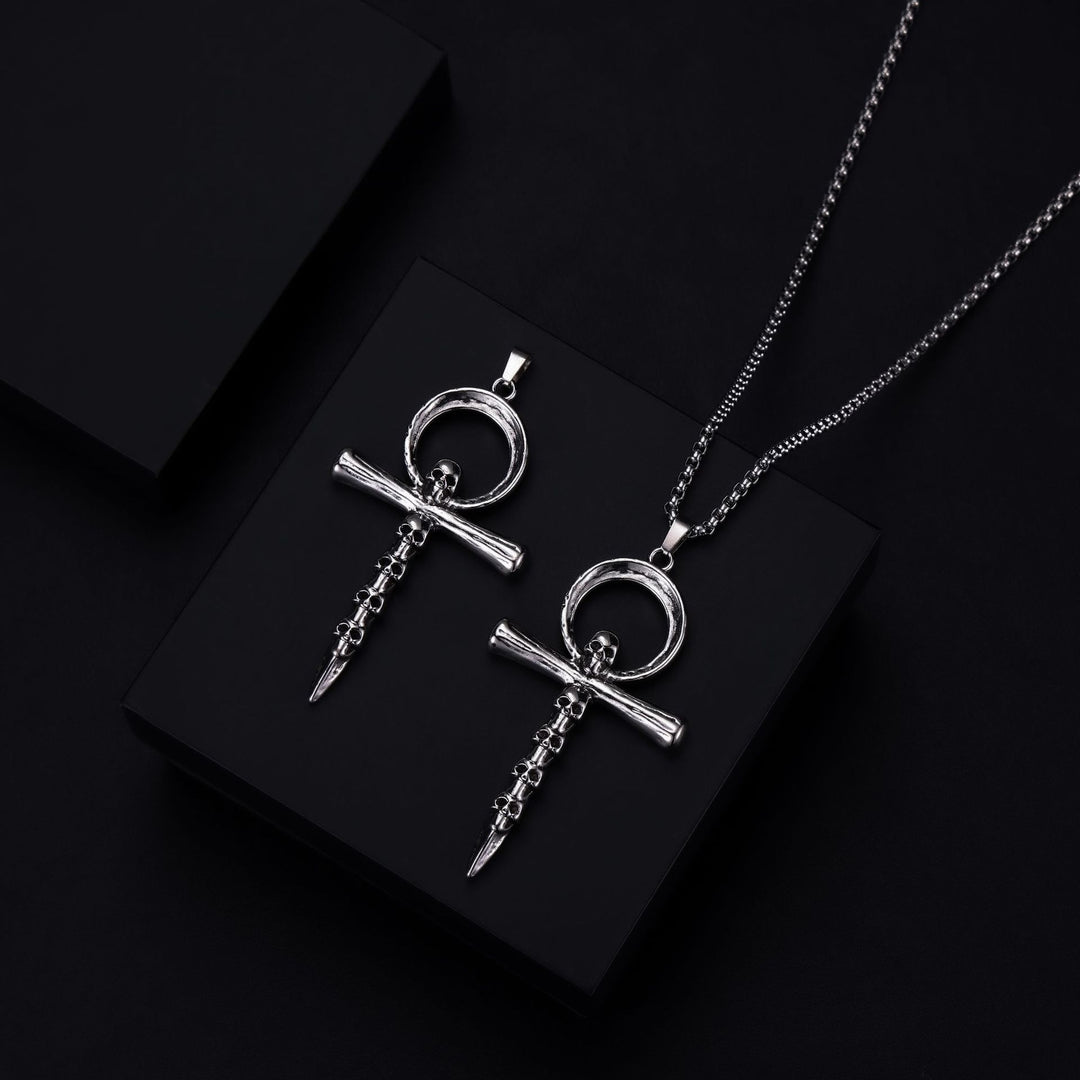 Multi-skull cross necklace