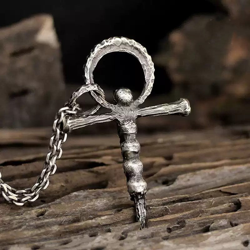 Multi-skull cross necklace