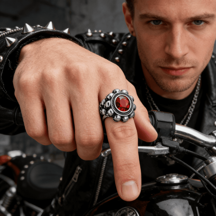 Red round gemstone skull ring