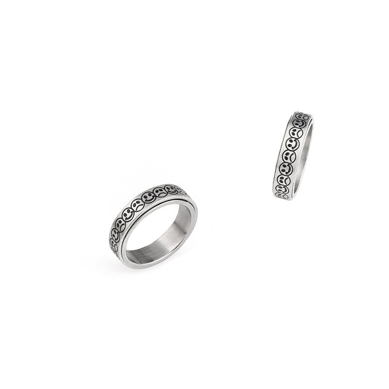 Rotatable smiley face ring