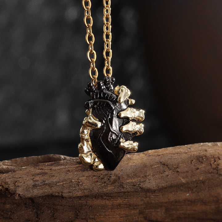 Heart Necklace in Hand