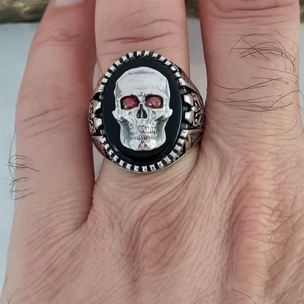 Silver Skull Ring with Ruby Eyes