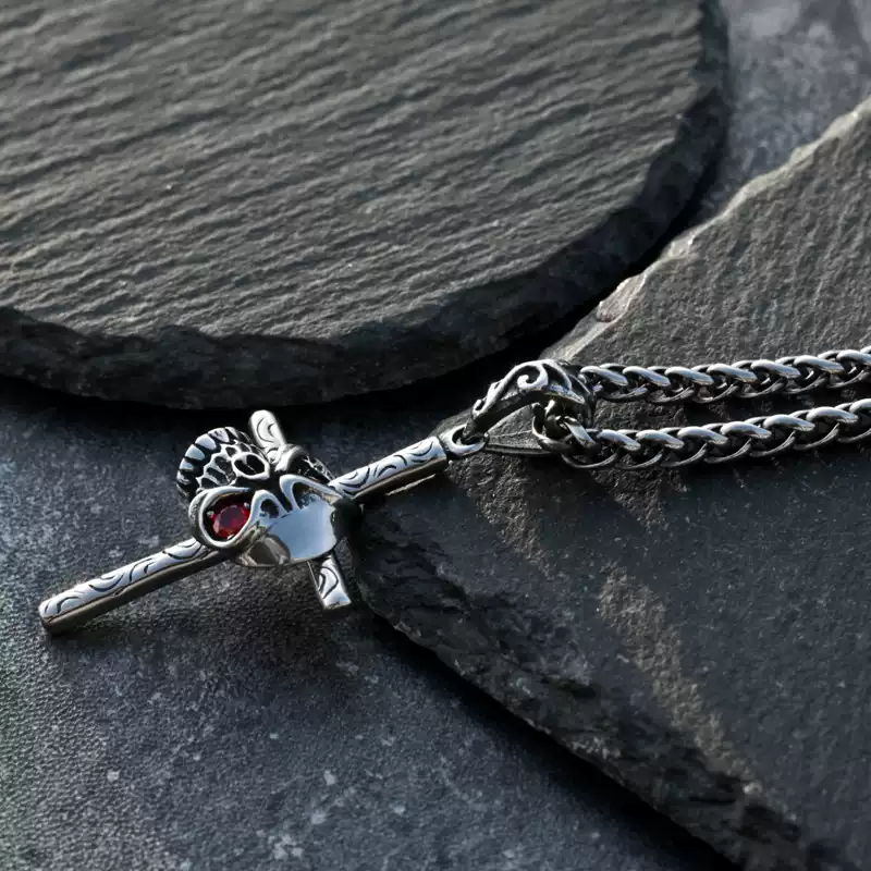 Moving skull cross necklace