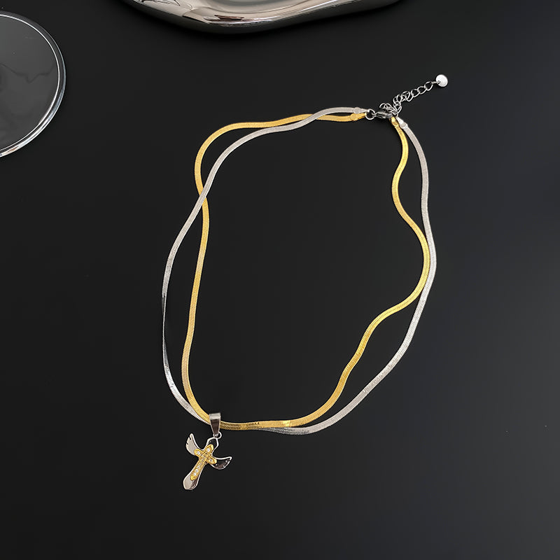 Double layer snake bone cross necklace