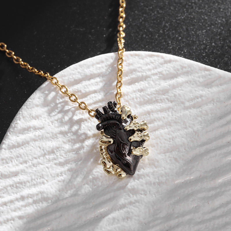 Heart Necklace in Hand