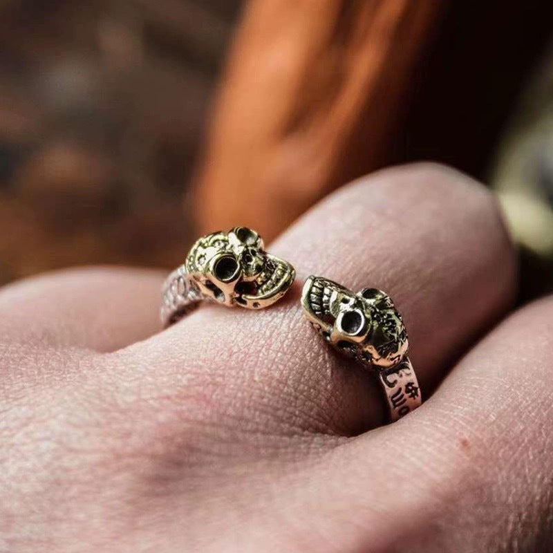 Double skull spiral ring