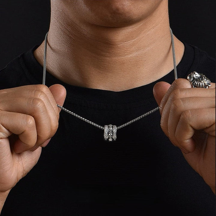 Rotatable skull necklace