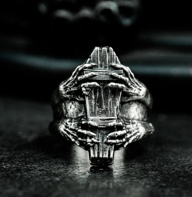 Old coffin skull finger ring
